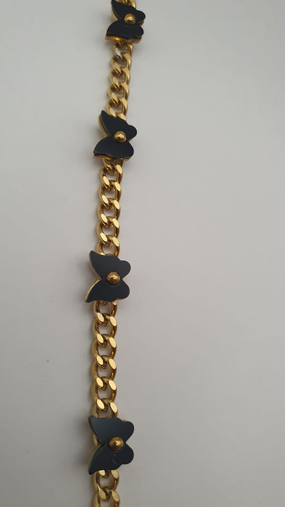 Elegant Black Butterfly with Golden Chain Bracelet.