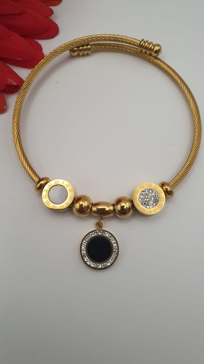 Elegant Bracelet with 2 Different Buttons and Hanging Black Button.