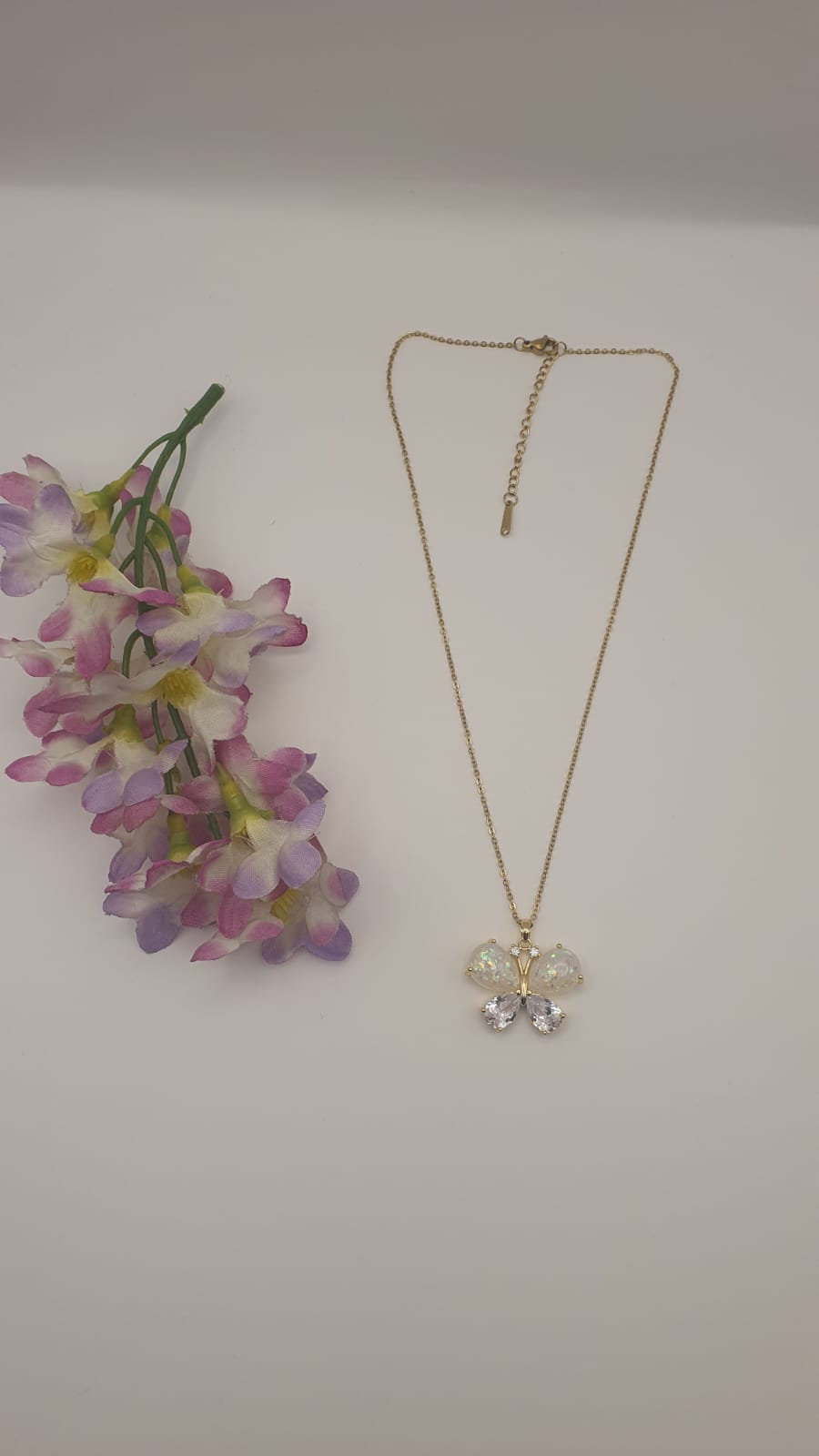 GalsFolks VividVerve White Pearl Butterfly Pendant with Golden Neck Chain - Timeless Elegance