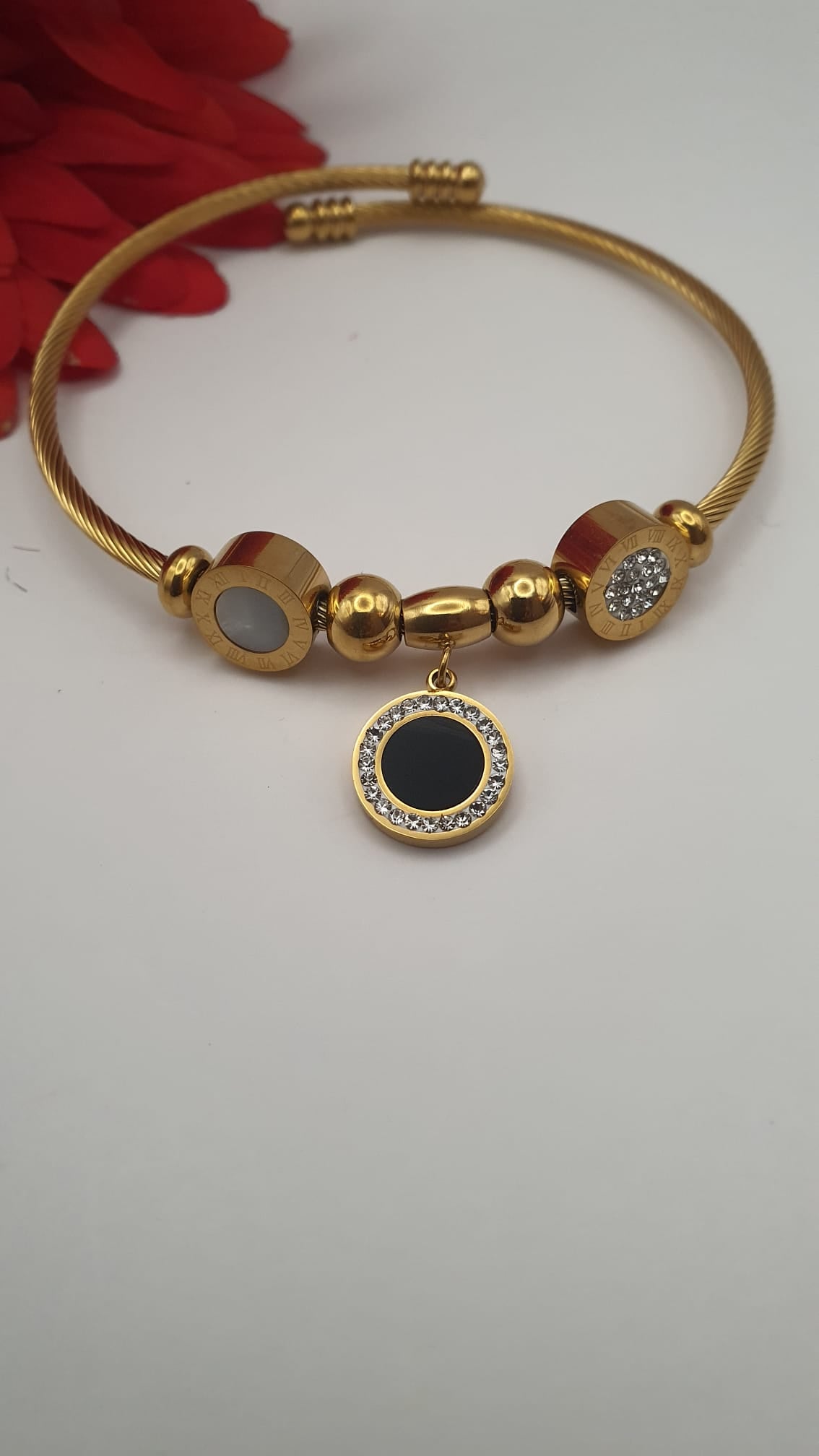 Elegant Bracelet with 2 Different Buttons and Hanging Black Button.