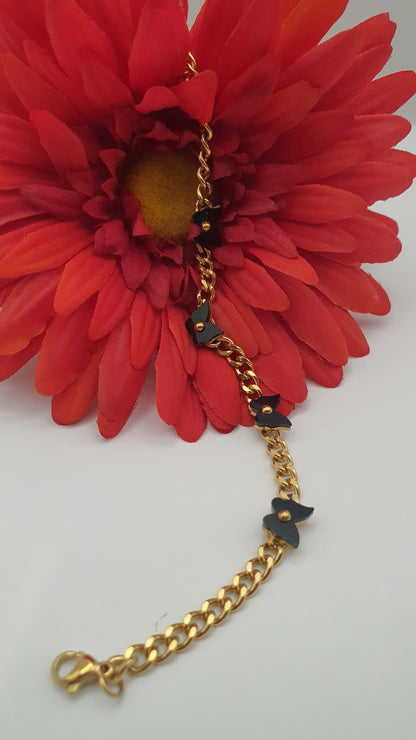 Elegant Black Butterfly with Golden Chain Bracelet.